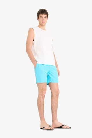 DeFacto Regular Fit Kısa Boy Cepli File Astarlı Beli Bağcıklı Düz Hafif Kumaş Deniz Şortu E5133AXNSTR111