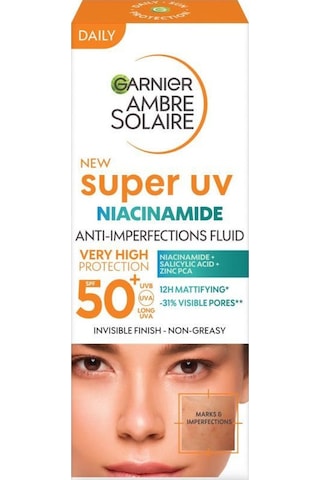 Garnier Ambre Solaire Super Uv Niasinamid Cilt Kusurları Karşıtı Günlük Güneş Koruyucu Fluid Krem SPF50+ 40 ML