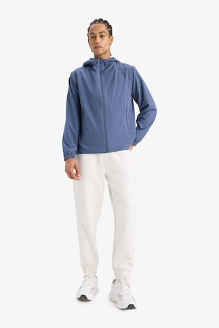 Defacto Defactofit Su İtici Regular Fit Kapüşonlu Fermuarlı İpek Kumaş Yağmurluk E9218ax25auın113 İndigo