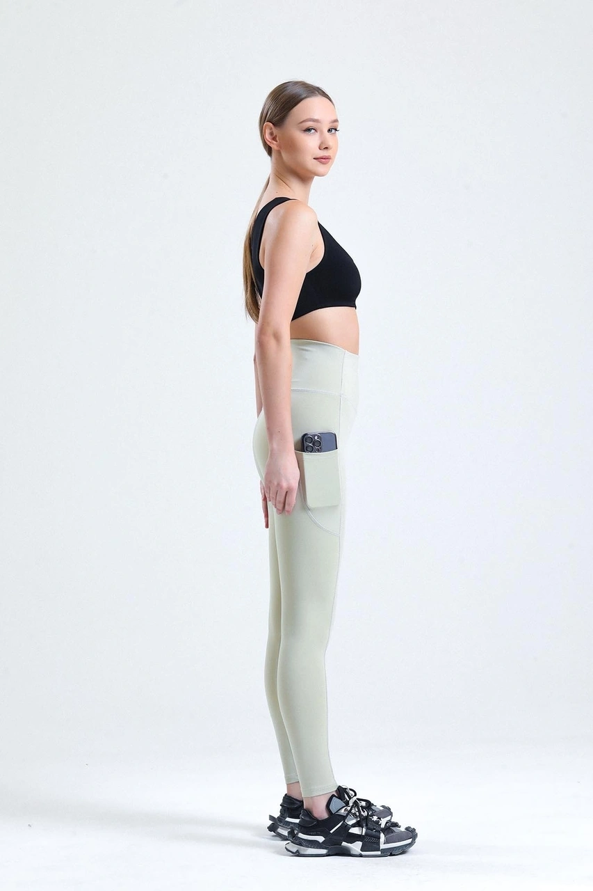 Thiff Gymwear Yeşil Yüksek Bel Sıkılaştırıcı Toparlayıcı Push-up Çift Cepli Bilek Hizasında Spor Tayt Taş