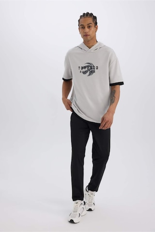 DeFactoFit Sporcu Jogger Eşofman Altı Slim Fit Dar Kesim Standart Paça Skuba Dalgıç Kumaş Beli Lastikli Düz Paça E3930AX24WNBK81 Siyah