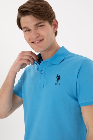 U.S. Polo Assn. Erkek Slim Fit Polo Yaka Turkuaz Basic Tişört 50305929-VR093