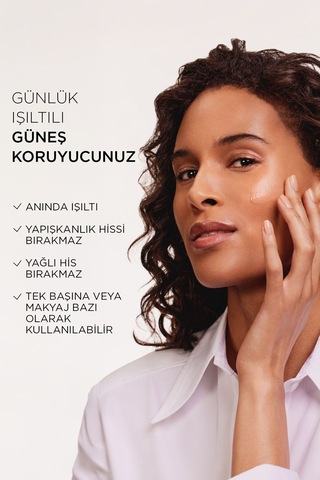 L'Oréal Paris Bright Reveal Koyu Leke Karşıtı Renkli Fluid Günlük Yüz Güneş Kremi SPF50 Medium 50 ML