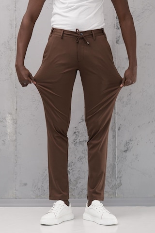 Beli Lastikli Ve İplikli Rayon Kumaş Regular Fit Likralı Jogger Pantolon Kahverengi