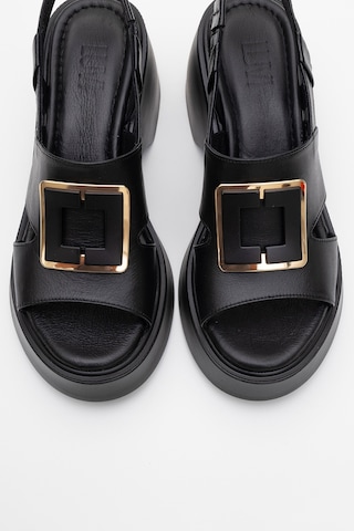 Luvishoes Lucıa Siyah Tokalı Hakiki Deri Kadın Dolgu Topuklu Sandalet Siyah