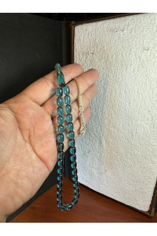 Ateş Kehribar Tesbih Kapsül Kesim 7 X 11mm Şeffaf/mavi T-257