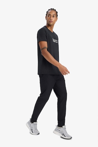 Defacto Esnek Kumaş Sporcu Jogger Eşofman Altı Slim Fit Dar Kesim Dokuma Üç Cepli Fermuarlı Paça B2780AX24SM Siyah