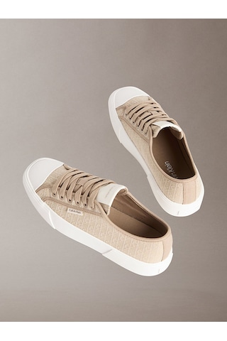 Calvin Klein Vulkanize Düşük Bilekli Bağcıklı Tamamı Baskılı Kanvas Kadın Bej Sneaker Hw0hw03142-a04 Bej