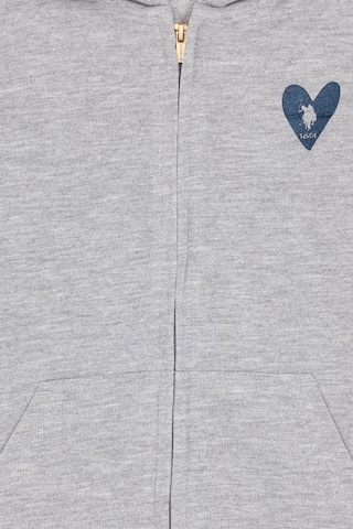 U.S. Polo Assn. Kız Çocuk Açık Gri Melanj Fermuarlı Basic Sweatshirt 50296390-VR091