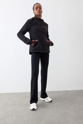 Defacto Defactofit Flare Fit İspanyol Paça Standart Boy Modal Sporcu Pantolon E8957ax25aubk81 Siyah