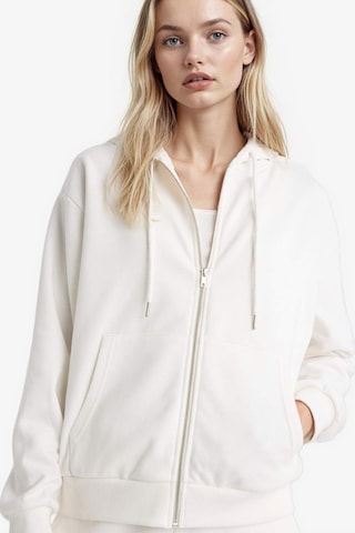 Defacto Relax Fit Kapüşonlu Cepli Basic Düz Fermuarlı Sweatshirt C1809AX24WNER105 Ekru