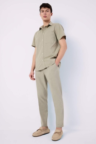 DeFacto %100 Pamuk Keten Görünümlü Yazlık Jogger Pantolon Dar Paça Beli Bağcıklı Lastikli Cepli Z6475AZ25SPKH404