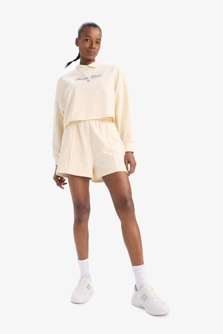 DeFacto Fit Oversize Geniş Kalıp Polo Yaka Baskılı Sporcu Kadın Sweatshirt - Ekru D7133AX25SPER109