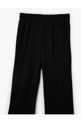 Koton Bürümcük Kumaş Beli Lastikli İspanyol Paça Pantolon Siyah 6skg40015ak Siyah