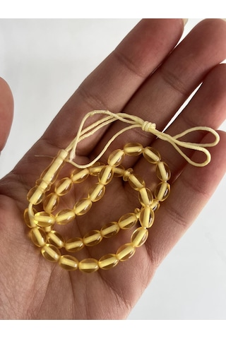 Oval Kesim Kokulu Toz Kehribar Tesbih 33lük 5mm A011