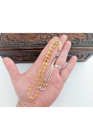 Damla Kehribar El Boy Arpa Kesim Gümüş Püsküllü Tesbih... Damla Gr : 6,1 Gümüş Gr : 4,7 Ölçü: 5,5 X 9,5 Şeffaf - Sarı