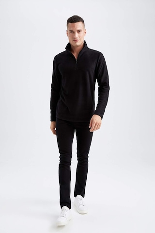 DeFacto Siyah Tüylenme Yapmayan Soğuk Geçirmez Regular Fit Dik Yaka Fermuarlı Polar Sweatshirt Y3996AZNSBK81
