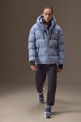 Defacto Su İtici Regular Fit Kapüşonlu Rüzgar Geçirmez Şişme Mont E9485ax25wngr530 Gri-gr530
