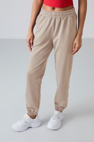 Tommy Life Koyu Bej Cepli Yüksek Bel Rahat Form Lastik Paça Kadın Eşofman Alt - 94583