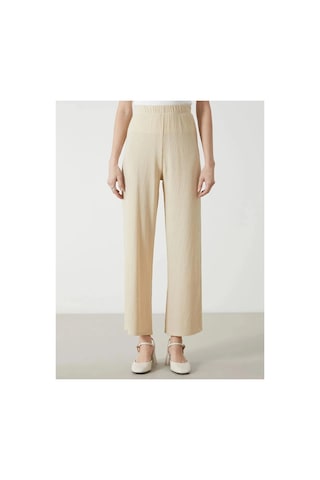 LC Waikiki Lcwaıkıkı Classic Bej Beli Lastikli Dokulu Kadın Pantolon Lıght Beıge