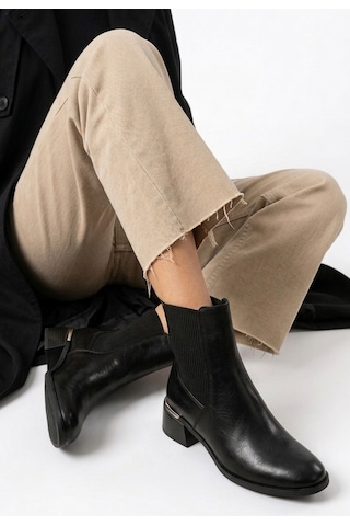 Yıldızdan Siyah Yanlardan Lastikli Termo Taban Kadın Topuklu Bot