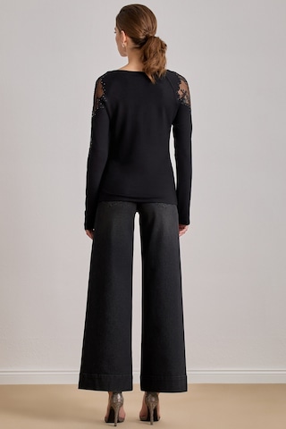 Reglan Kollu Siyah Örme Bluz Siyah