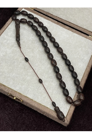 Sistemli Arpa Kesim Koyu Kahve Venge Ağacı Tesbih 8x12 Mm Kahverengi