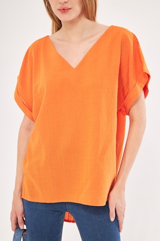 Armonika Kadın Turuncu V Yaka Yanları Yırtmaçlı Arkası Uzun Duble Kol Detaylı Oversize Bluz Arm-24y001074