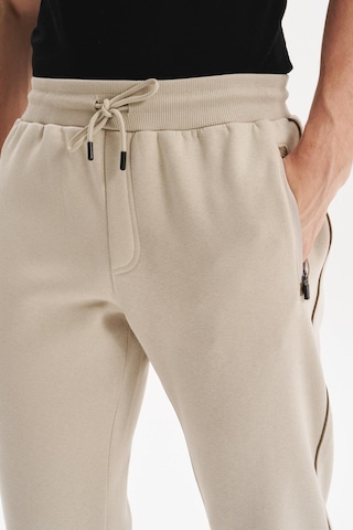 Ar-ma Erkek Örme 3 İplik Kumaş Dar Paça Eşofman Altı Regular Fit Lastikli Bel %70 Pamuk %30 Polyester K30174681602 Bej-b1 Bej