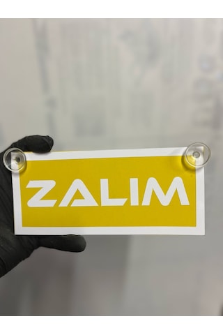 Sarı Renk Üzeri Beyaz Renk Zalım Yazılı Vantuzlu Cam Süsü Sarı Renk Üzeri Beyaz Renk Zalım Yazılı Vantuzlu Cam Süsü