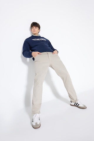 Wrangler Texas Slim Fit Dar Kesim Normal Bel Dar Paça Esnek Bej Erkek Pantolon - W212331 Bej