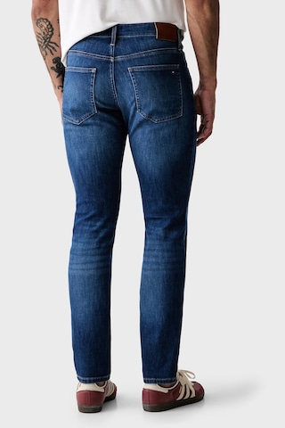 Tommy Jeans Pamuklu Slim Fit Normal Bel Dar Paça Jean Erkek Kot Pantolon Dm0dm23395 1ab Açık Mavi