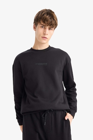DeFacto Boxy Fit Bisiklet Yaka Baskılı Sweatshirt X8282AZ24AUBK81