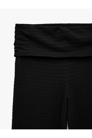 Koton Bürümcük Kumaş Dokulu Belden Kat Detaylı Düz Bol Paça Pantolon Siyah 6sak40133ek