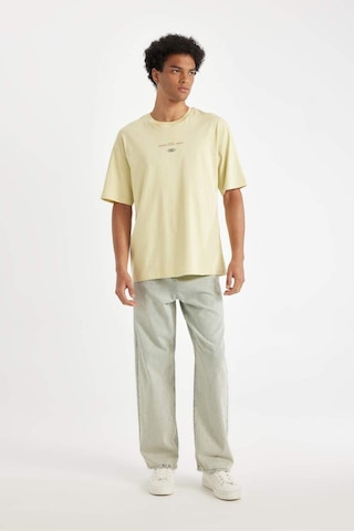 DeFacto %100 Pamuk Comfort Regular Fit Rahat Kesim Bisiklet Yaka Sırt Baskılı Kısa Kollu Tişört C6142AX24AUGN654