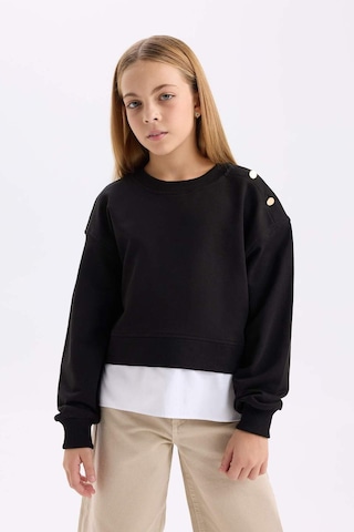 DeFacto Kız Çocuk Relax Fit Bisiklet Yaka Etek Ucu Detaylı Sweatshirt D0703A824AUBK81 Siyah