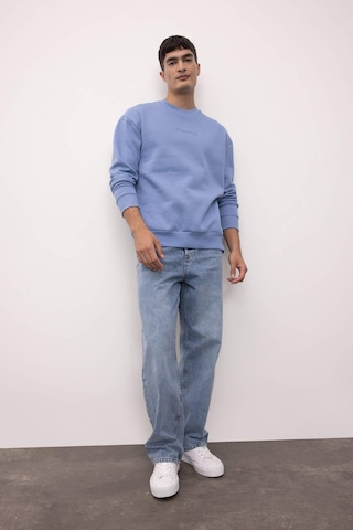 Defacto Boxy Fit Bisiklet Yaka Baskılı Sweatshirt X8282AZ24AUBE797 Mavi
