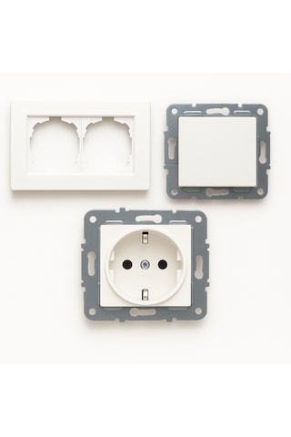 Karen Serisi Beyaz Tuşlu Anahtar Ve Topraklı Priz Seti 2'li Çerçeveyle Uyumlu