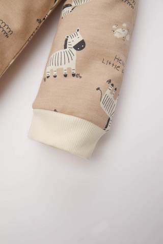 DeFacto Erkek Bebek Yenidoğan Zebra Desenli Uzun Kollu Tulum D4134A524WNBG390 Bej