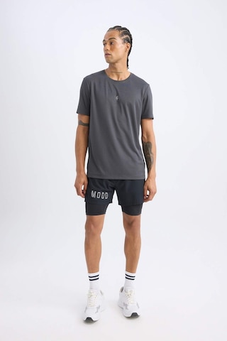 DeFactoFit Slim Fit Dar Kesim Fermuarlı Telefon Cepli Sporcu Taytlı Şort Z2147AZ25SPBK81