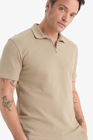 DeFacto Regular Fit Polo Yaka Kısa Kollu Dokulu Tişört E4027AX25SPBG769