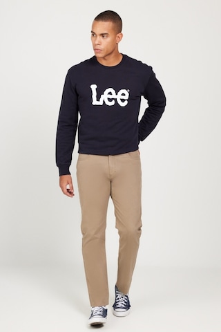Lee Extreme Motion Slim Fit Dar Kesim Normal Bel Dar Paça Esnek Kahverengi Erkek Pantolon Kahverengi