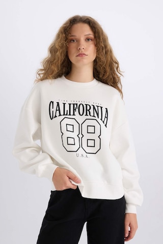 DeFacto Loose Fit Bisiklet Yaka Baskılı Kalın Kumaş Sweatshirt E3388AXNSWT32