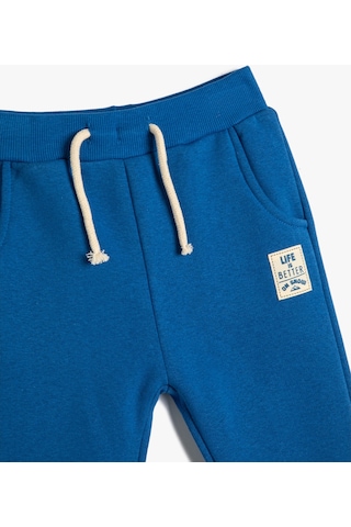 Koton Jogger Eşofman Altı Aplike Detaylı Beli Bağlamalı Şardonlu Mavi 4wmb40158tk 4WMB40158TK601 Mavi