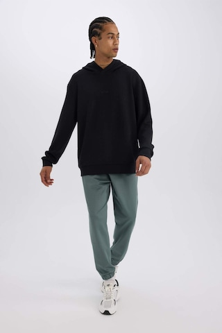 DeFactoFit Sporcu Jogger Eşofman Altı Standart Fit Basic Düz Cepli Beli Paçası Lastikli D3742AX24WNGN1019 Yeşil
