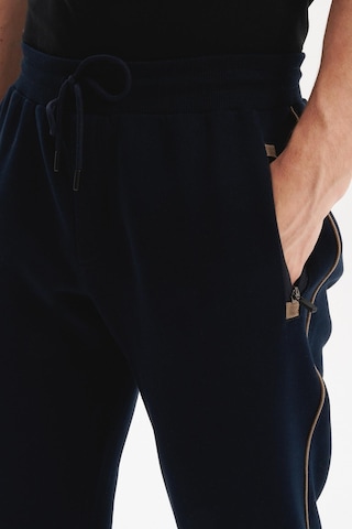 AR-MA Arma Erkek Örme 3 İplik Kumaş Dar Paça Eşofman Altı Regular Fit Lastikli Bel %70 Pamuk %30 Polyester K30174681602 Lacivert