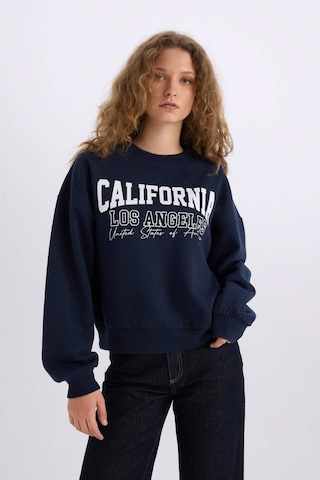 DeFacto Loose Fit Bisiklet Yaka Baskılı Kalın Kumaş Sweatshirt E3390AXNSNV44