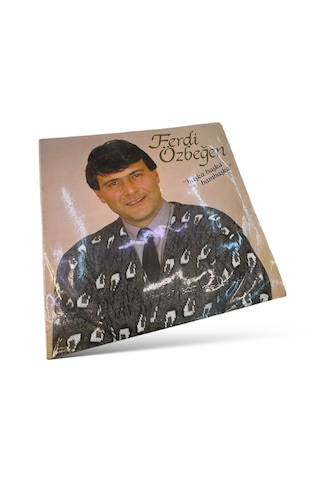 Ferdi Özbeğen Başka Başka Bambaşka Dönem Baskısı