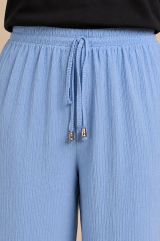 Ertaştrendstore Kadın Battal Beden Bürümcük Kumaş Beli Lastikli Bağcıklı Bol Paça Palazzo Pantolon - Bebek Mavisi Çok Renk