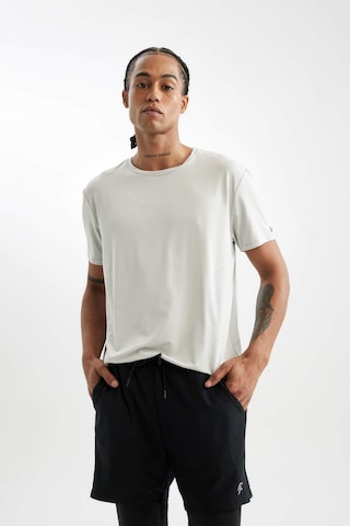 DeFactoFit Slim Fit Dar Kesim Sporcu Uzun Taytlı Dokuma Şort A9124AX24AUBK81